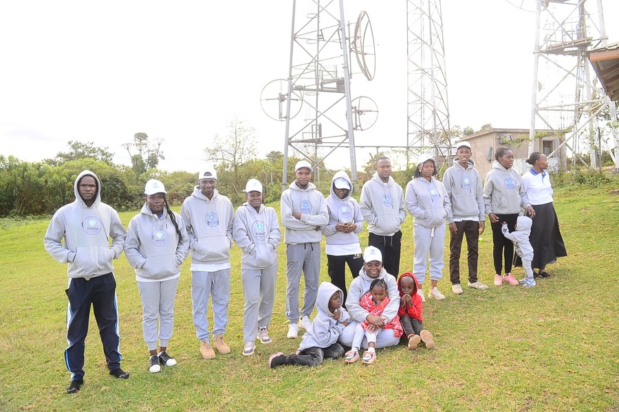 The Maesio team and families together outdoors